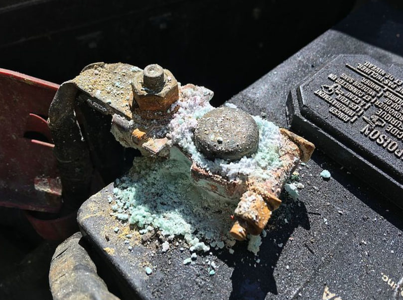 How to clean corroded battery terminals?